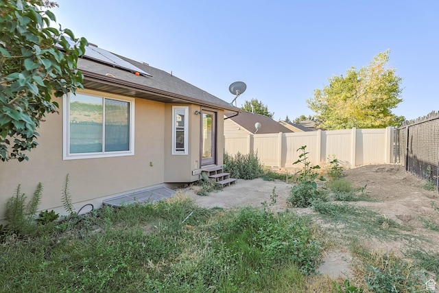 6228 S Waller Ln, West Jordan, UT 84081 - fenced backyard featuring entry steps