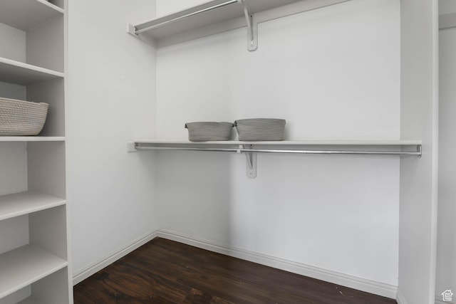 6228 S Waller Ln, West Jordan, UT 84081 - spacious closet featuring dark wood-style floors