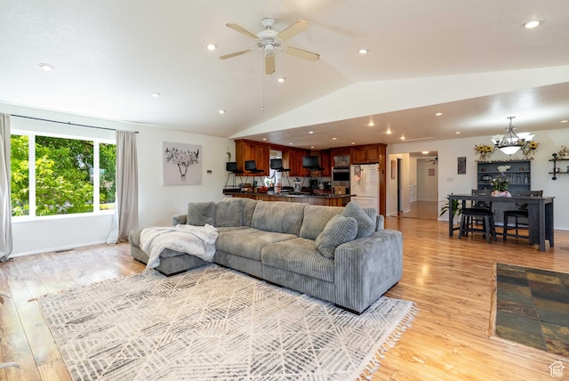 1663 W 2500 N, Vernal, UT 84078 - living room with vaulted ceiling, light wood-style flooring, a chandelier, ceiling fan, and recessed lighting