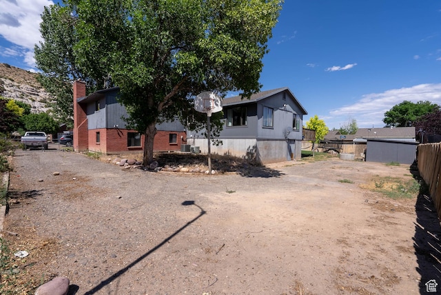 1663 W 2500 N, Vernal, UT 84078 - view of front of property featuring dirt driveway and a chimney