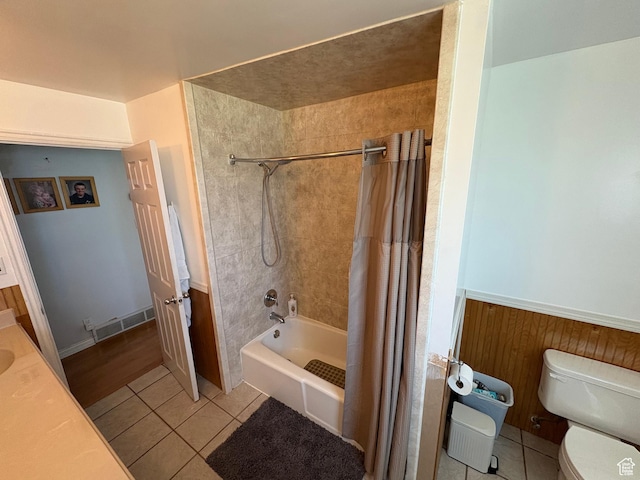4208 S 4205 W, West Valley City, UT 84120 - bathroom featuring tile patterned flooring, shower / bath combo, and a wainscoted wall