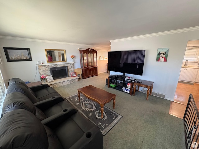 4208 S 4205 W, West Valley City, UT 84120 - living room with carpet, crown molding, and a stone fireplace