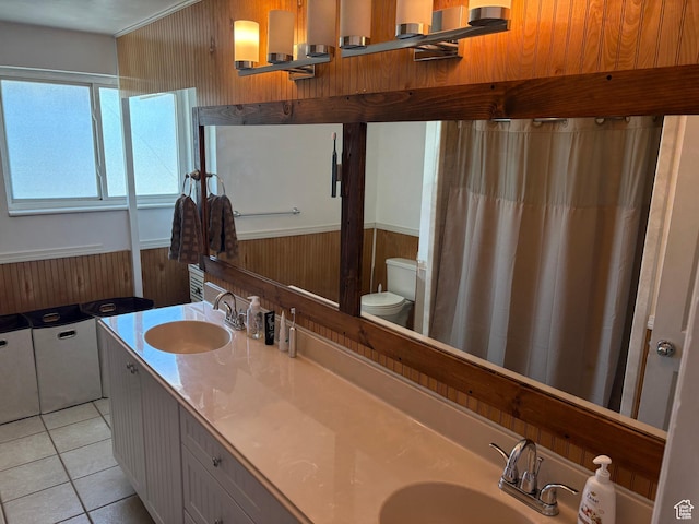 4208 S 4205 W, West Valley City, UT 84120 - bathroom with wood walls, double vanity, tile patterned flooring, and wainscoting
