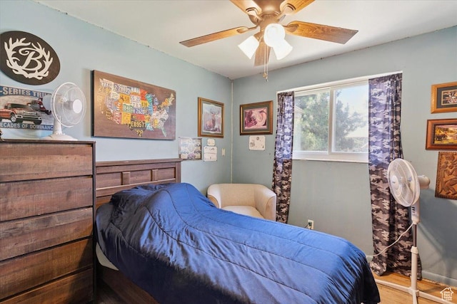 2262 W 2300 N, Clinton, UT 84015 - bedroom with wood finished floors and ceiling fan