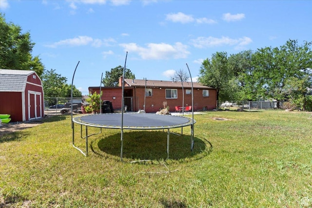 2262 W 2300 N, Clinton, UT 84015 - view of yard with a trampoline and a storage unit