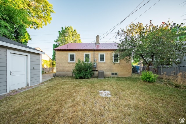252 E 1000 N, Logan, UT 84321 - rear view of house with a metal roof and brick siding