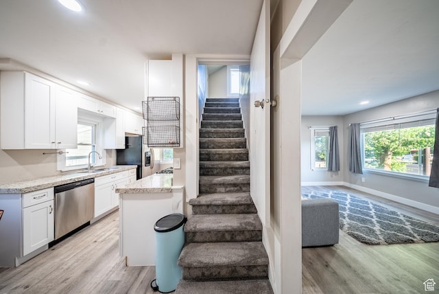 252 E 1000 N, Logan, UT 84321 - stairway with wood finished floors and recessed lighting