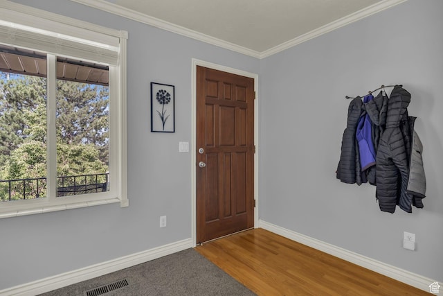 1834 N 200 E, Centerville, UT 84014 - foyer entrance featuring healthy amount of natural light, crown molding, and wood finished floors