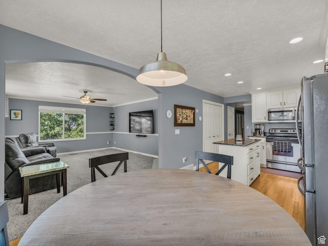 1834 N 200 E, Centerville, UT 84014 - dining area featuring a textured ceiling, ceiling fan, recessed lighting, and light colored carpet