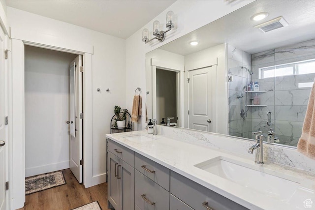 3380 W 3275 N, Plain City, UT 84404 - bathroom featuring a stall shower, double vanity, wood finished floors, and recessed lighting