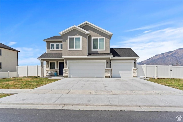 3380 W 3275 N, Plain City, UT 84404 - view of front of property featuring stone siding, concrete driveway, a garage, stucco siding, and a mountain view