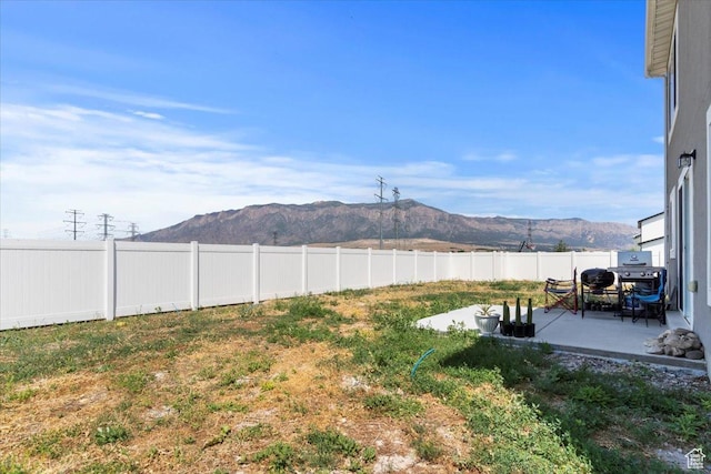 3380 W 3275 N, Plain City, UT 84404 - fenced backyard with a mountain view and a patio