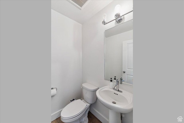 3380 W 3275 N, Plain City, UT 84404 - bathroom featuring toilet and wood finished floors