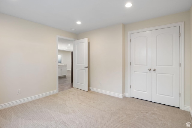 889 S Sego Lily Way, Mapleton, UT 84664 - unfurnished bedroom featuring light colored carpet, recessed lighting, and a closet