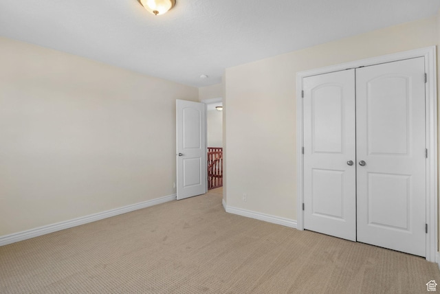 889 S Sego Lily Way, Mapleton, UT 84664 - unfurnished bedroom with light colored carpet and a closet