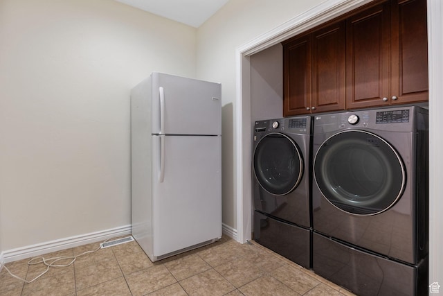 889 S Sego Lily Way, Mapleton, UT 84664 - laundry area featuring separate washer and dryer, cabinet space, and light tile patterned floors