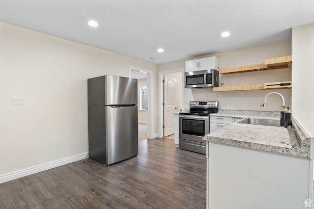 889 S Sego Lily Way, Mapleton, UT 84664 - kitchen featuring appliances with stainless steel finishes, dark wood finished floors, open shelves, white cabinets, and recessed lighting