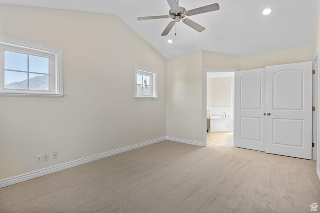 889 S Sego Lily Way, Mapleton, UT 84664 - unfurnished bedroom with light carpet, lofted ceiling, ensuite bath, recessed lighting, and a ceiling fan