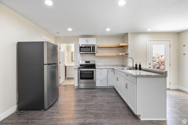 889 S Sego Lily Way, Mapleton, UT 84664 - kitchen featuring stainless steel appliances, open shelves, dark wood-style floors, recessed lighting, and white cabinetry