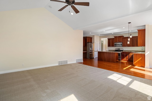 889 S Sego Lily Way, Mapleton, UT 84664 - unfurnished living room with dark carpet, a ceiling fan, recessed lighting, lofted ceiling, and dark wood-style flooring