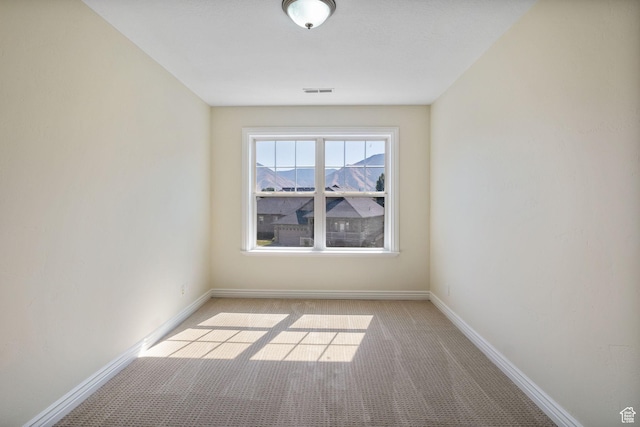 889 S Sego Lily Way, Mapleton, UT 84664 - spare room with light colored carpet and baseboards