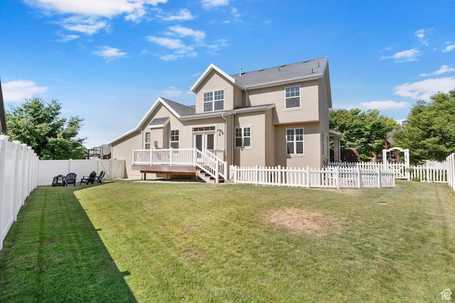 889 S Sego Lily Way, Mapleton, UT 84664 - back of house with stucco siding, a fenced backyard, a wooden deck, and french doors