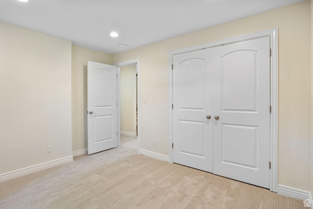 889 S Sego Lily Way, Mapleton, UT 84664 - unfurnished bedroom with light colored carpet, a closet, and recessed lighting