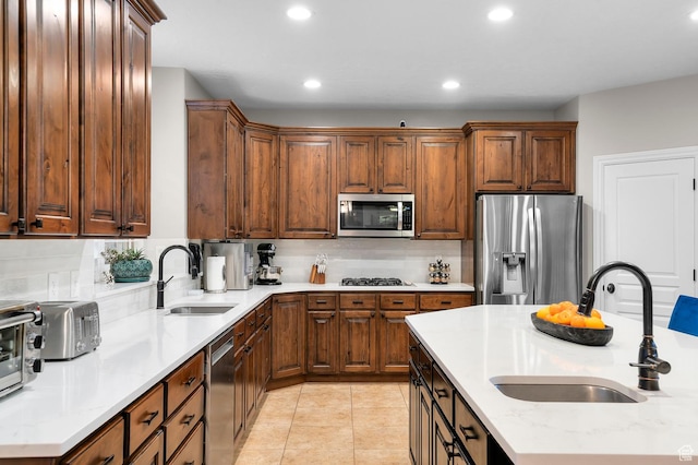 292 E Clubview Ln, Lehi, UT 84043 - kitchen with stainless steel appliances, recessed lighting, decorative backsplash, light tile patterned floors, and light stone countertops