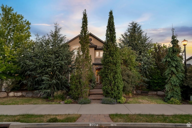 292 E Clubview Ln, Lehi, UT 84043 - view of property hidden behind natural elements featuring stucco siding