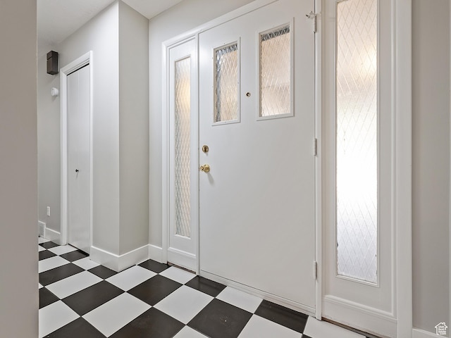 4525 S Taylor Ave E, Ogden, UT 84403 - foyer entrance featuring tile patterned floors and baseboards