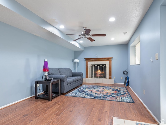4525 S Taylor Ave E, Ogden, UT 84403 - living area featuring wood finished floors, a ceiling fan, recessed lighting, and a fireplace