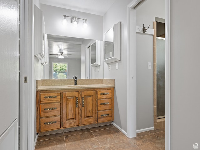 4525 S Taylor Ave E, Ogden, UT 84403 - bathroom with ceiling fan, vanity, tiled shower, and tile patterned flooring