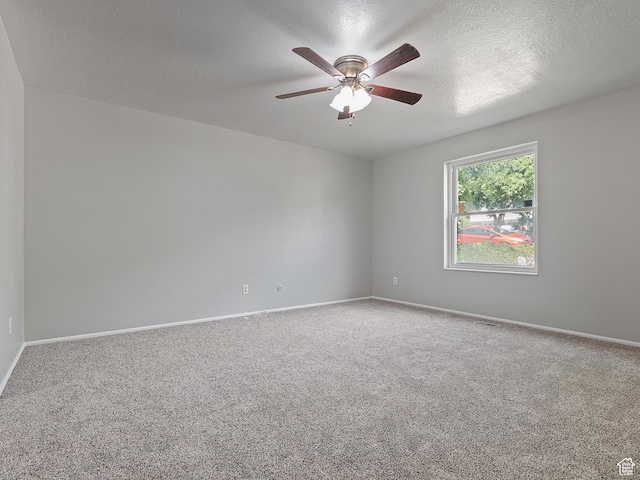 4525 S Taylor Ave E, Ogden, UT 84403 - carpeted spare room with ceiling fan and a textured ceiling