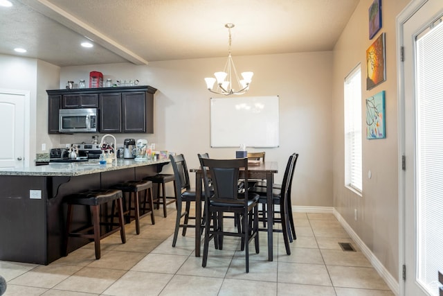 373 E 535 S, Vernal, UT 84078 - dining area with a chandelier, light tile patterned flooring, and recessed lighting