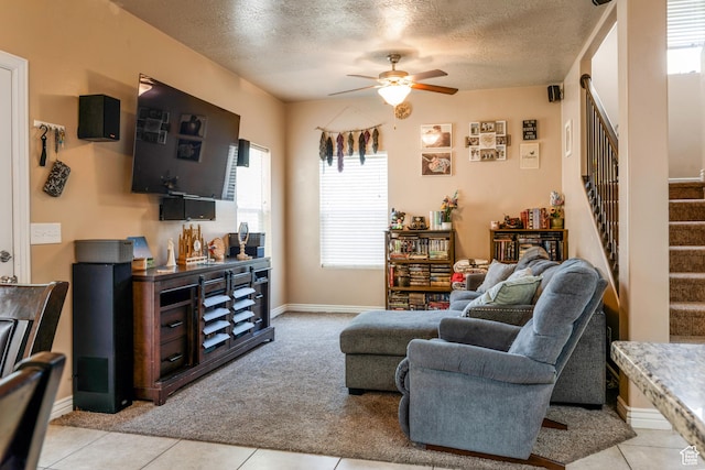 373 E 535 S, Vernal, UT 84078 - living area with a ceiling fan, stairway, a textured ceiling, healthy amount of natural light, and light carpet
