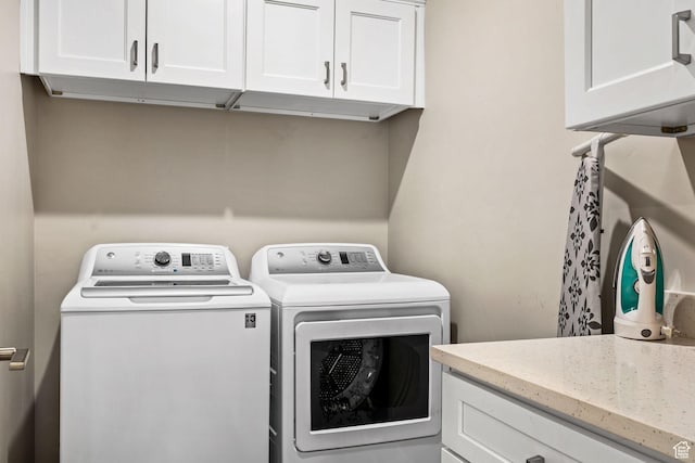 259 N 2020 W, Hurricane, UT 84737 - laundry room with washer and clothes dryer and cabinet space