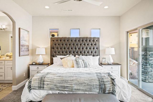259 N 2020 W, Hurricane, UT 84737 - bedroom featuring access to exterior, arched walkways, carpet floors, ensuite bathroom, and recessed lighting