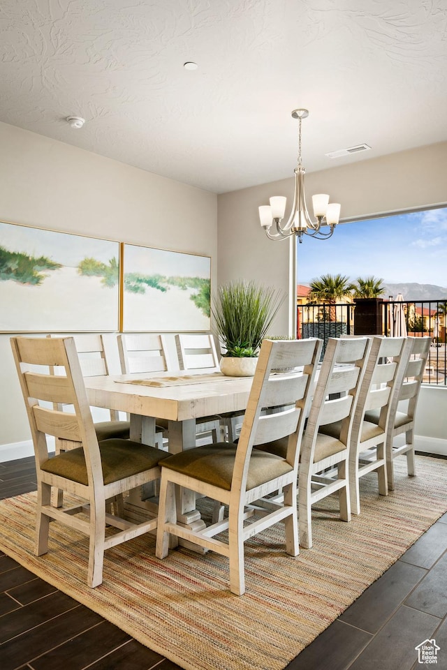 259 N 2020 W, Hurricane, UT 84737 - dining area featuring a chandelier and wood finished floors