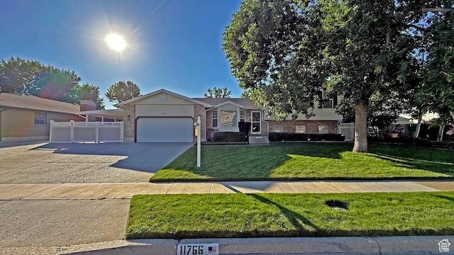 11766 S Hidden Valley Rd E, Sandy, UT 84092 - ranch-style house with brick siding, a garage, and driveway