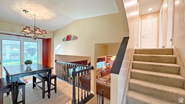 11766 S Hidden Valley Rd E, Sandy, UT 84092 - dining space featuring a chandelier and vaulted ceiling