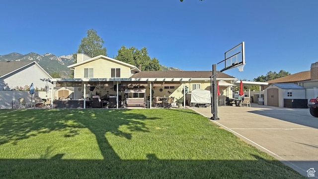 11766 S Hidden Valley Rd E, Sandy, UT 84092 - rear view of property with a storage unit, a pergola, a patio area, a chimney, and a lawn