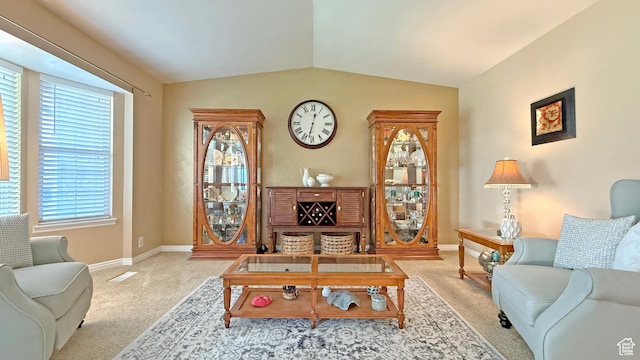 11766 S Hidden Valley Rd E, Sandy, UT 84092 - carpeted living area featuring lofted ceiling and baseboards