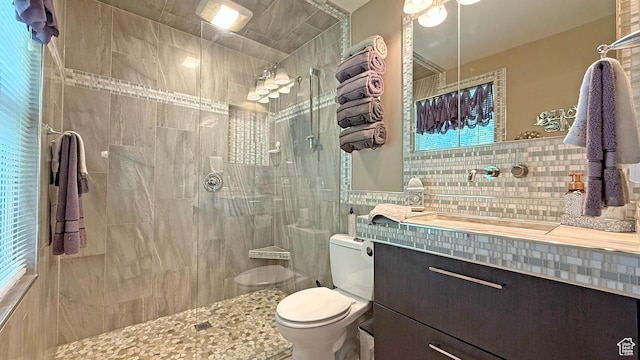 11766 S Hidden Valley Rd E, Sandy, UT 84092 - full bath featuring tile walls, a walk in shower, and vanity
