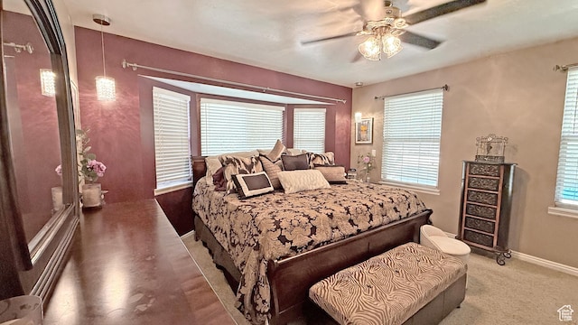 11766 S Hidden Valley Rd E, Sandy, UT 84092 - bedroom with multiple windows and ceiling fan