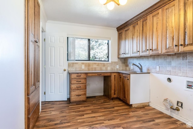 869 N 1600 E, Preston, ID 83263 - laundry area with hookup for a washing machine, ornamental molding, dark wood-style floors, cabinet space, and a desk