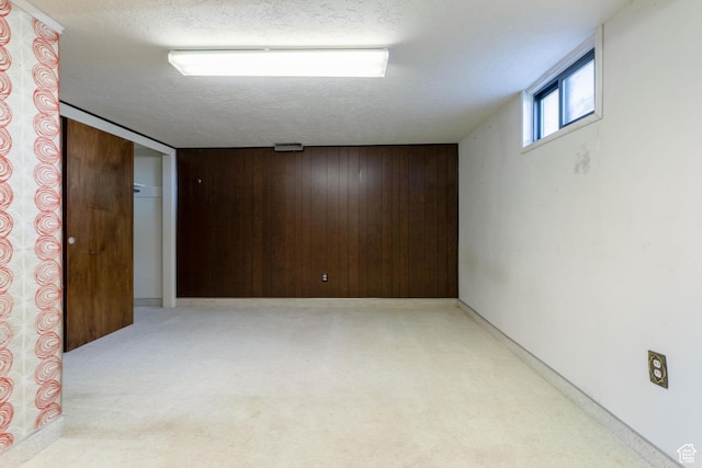 869 N 1600 E, Preston, ID 83263 - basement featuring wooden walls and a textured ceiling