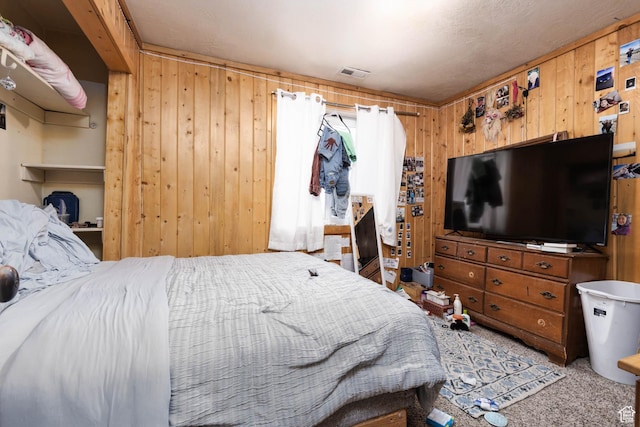 440 N Quarry Rd, Salina, UT 84654 - bedroom with light colored carpet and wood walls