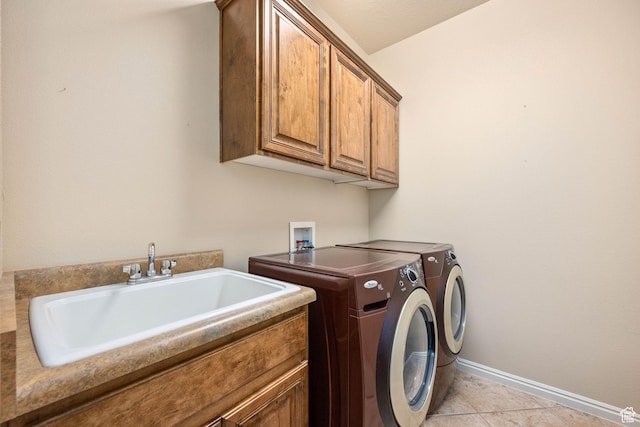 1200 N Crown King Ave, Washington, UT 84780 - laundry area featuring independent washer and dryer, cabinet space, and light tile patterned floors