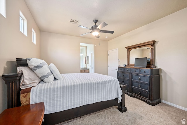 1200 N Crown King Ave, Washington, UT 84780 - bedroom with light carpet, connected bathroom, and ceiling fan