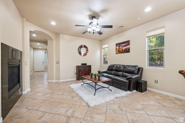 1200 N Crown King Ave, Washington, UT 84780 - living area featuring ceiling fan, arched walkways, plenty of natural light, light tile patterned flooring, and recessed lighting